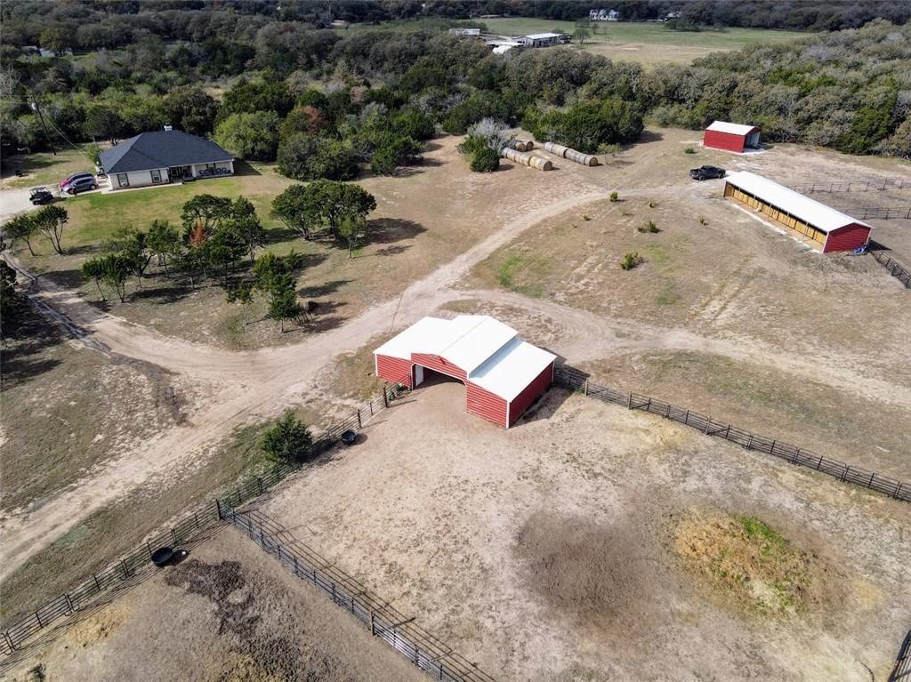 3164 Clater Powell Road Waco, TX 76705 - Photo 38 of 40 an aerial view of a house with a yard and lake view