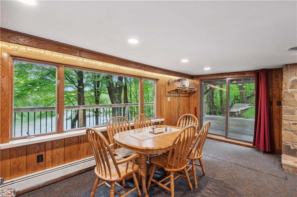 750 Lake Road Addison, PA 15411 - Photo 34 of 44 a dining room with furniture water view and balcony