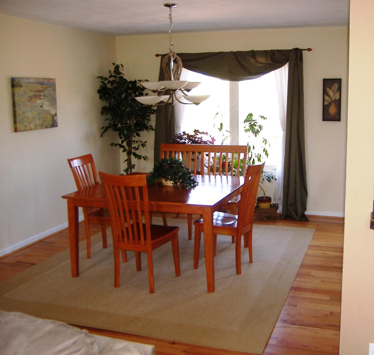 921 Webster Corner Road Callaway, VA 24067 - Photo 3 of 12 a dining room filled chandelier and wooden floor