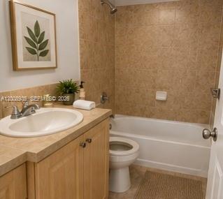 948 Southwest 3rd Street, Unit 205 Miami, FL 33130 - Photo 6 of 11 a bathroom with a sink a toilet and a bathtub