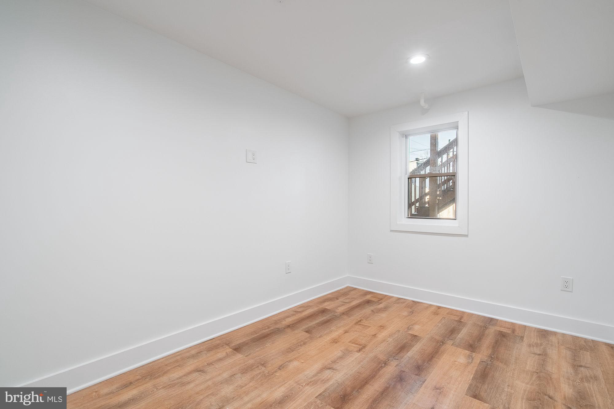 36 Channing Street Northwest, Unit A Washington, DC 20001 - Photo 17 of 33 an empty room with a window