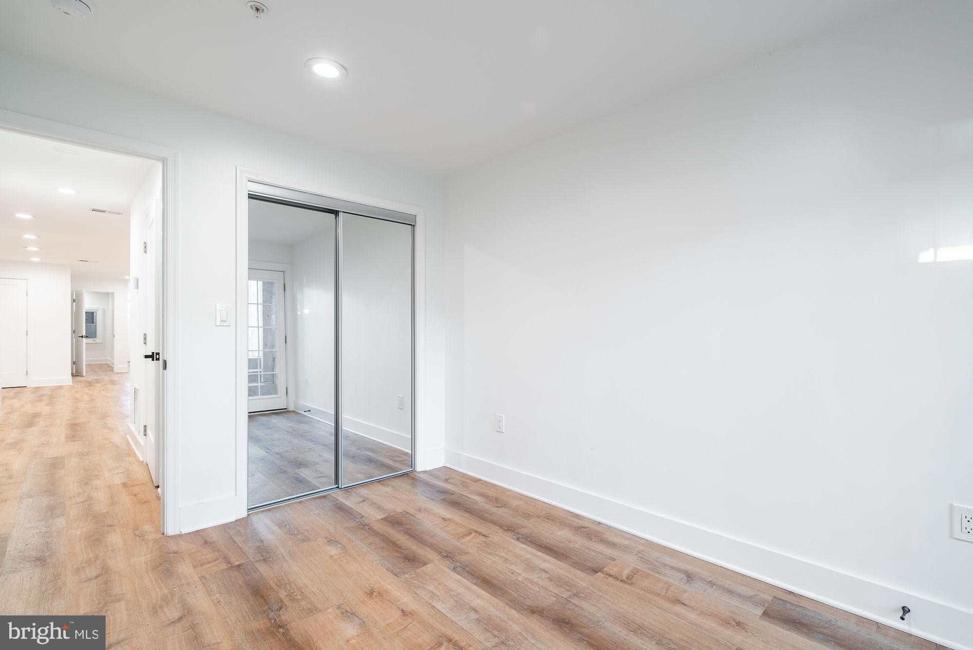 36 Channing Street Northwest, Unit A Washington, DC 20001 - Photo 20 of 33 wooden floor in an empty room