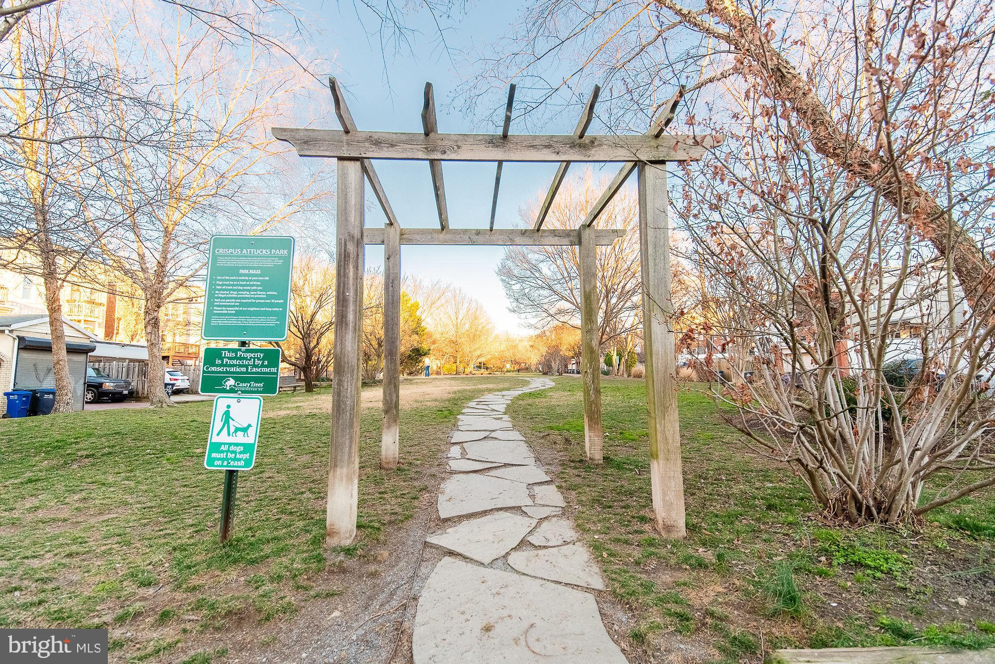 36 Channing Street Northwest, Unit A Washington, DC 20001 - Photo 28 of 33 a backyard of a house with table and chairs