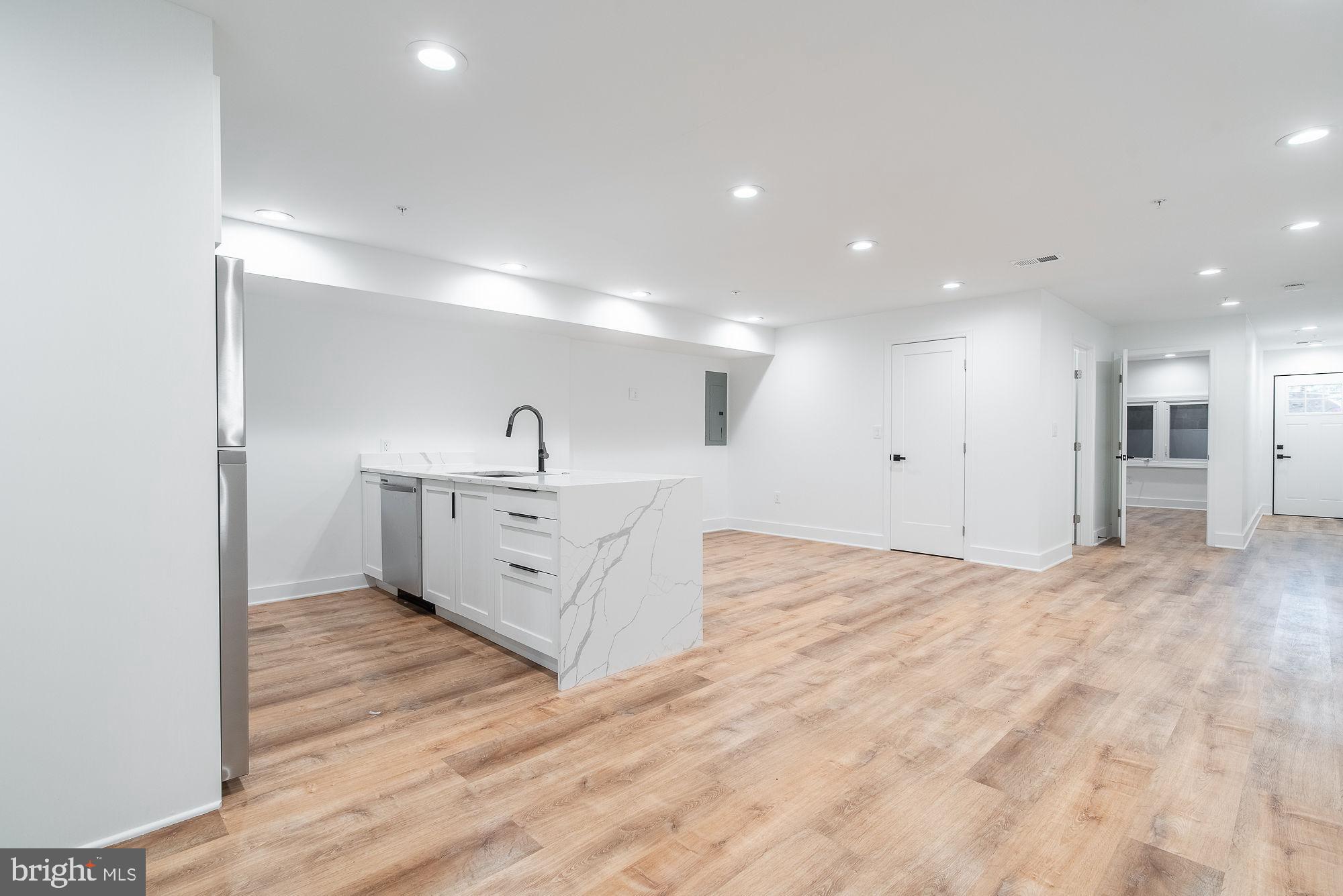 36 Channing Street Northwest, Unit A Washington, DC 20001 - Photo 5 of 33 a view of a kitchen with a sink