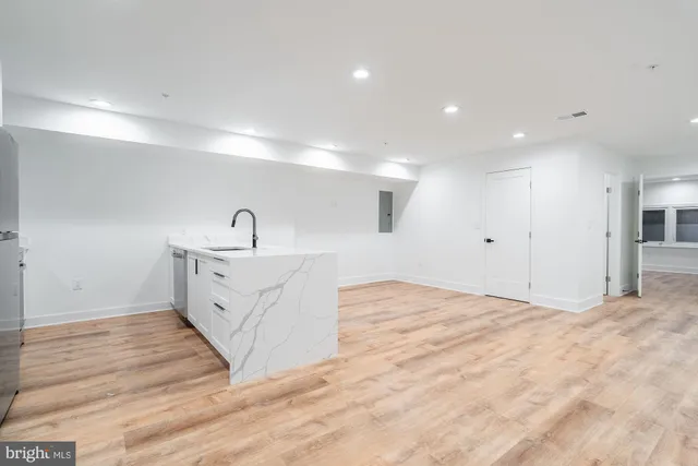 a view of a kitchen with a sink