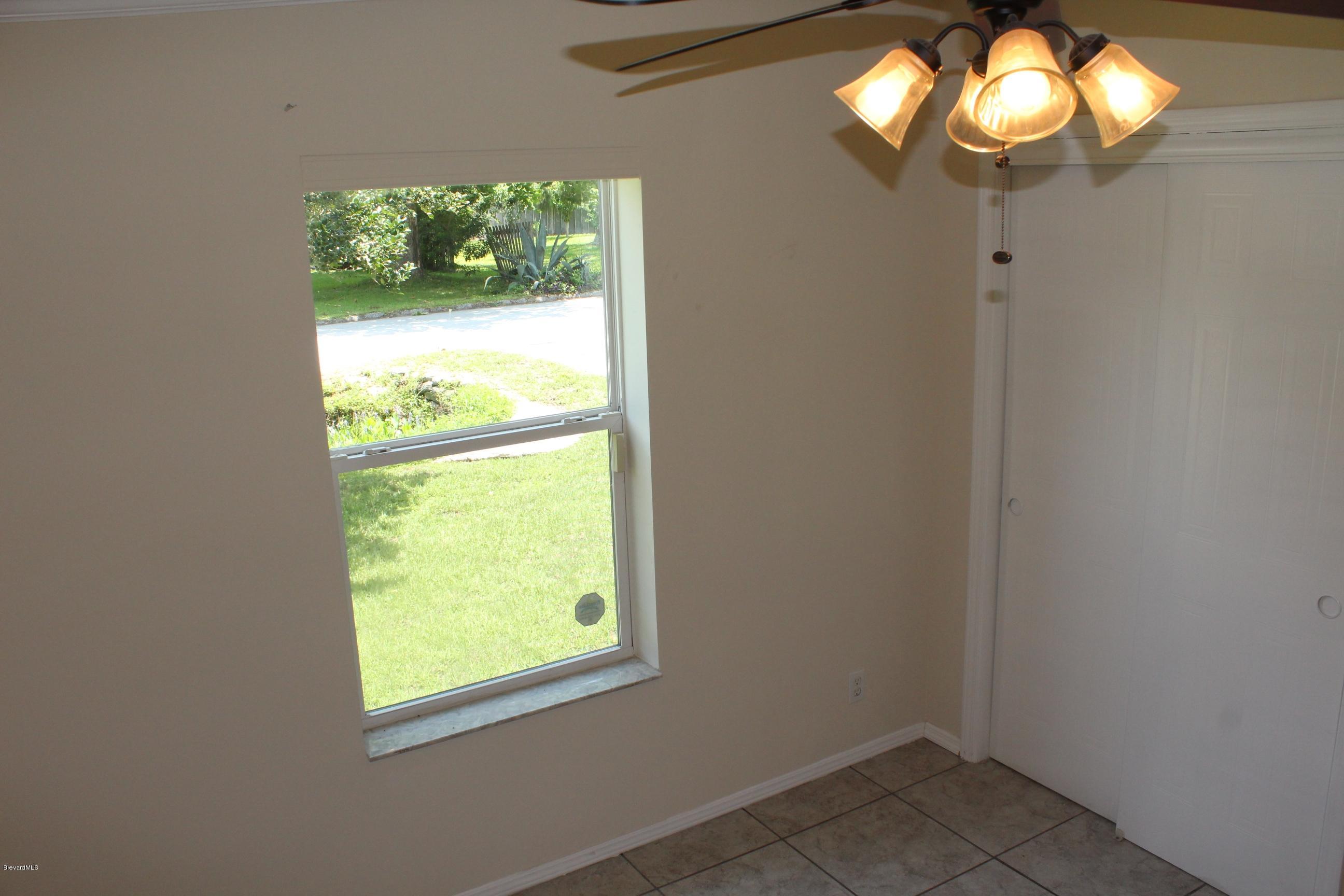 1419 Belleview Road Cocoa, FL 32922 - Photo 13 of 20 2nd bedroom with closet view