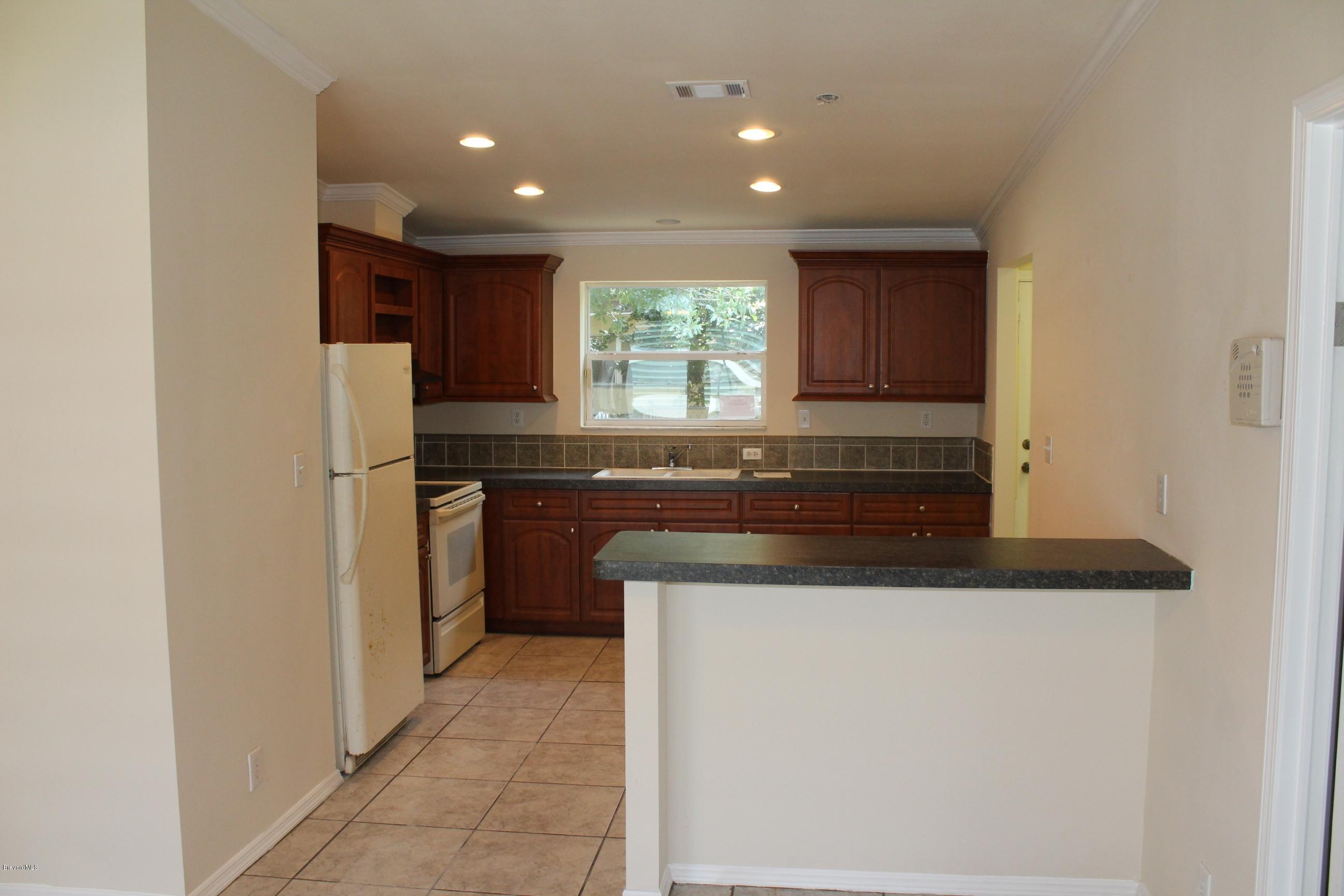 1419 Belleview Road Cocoa, FL 32922 - Photo 3 of 20 Kitchen with breakfast bar