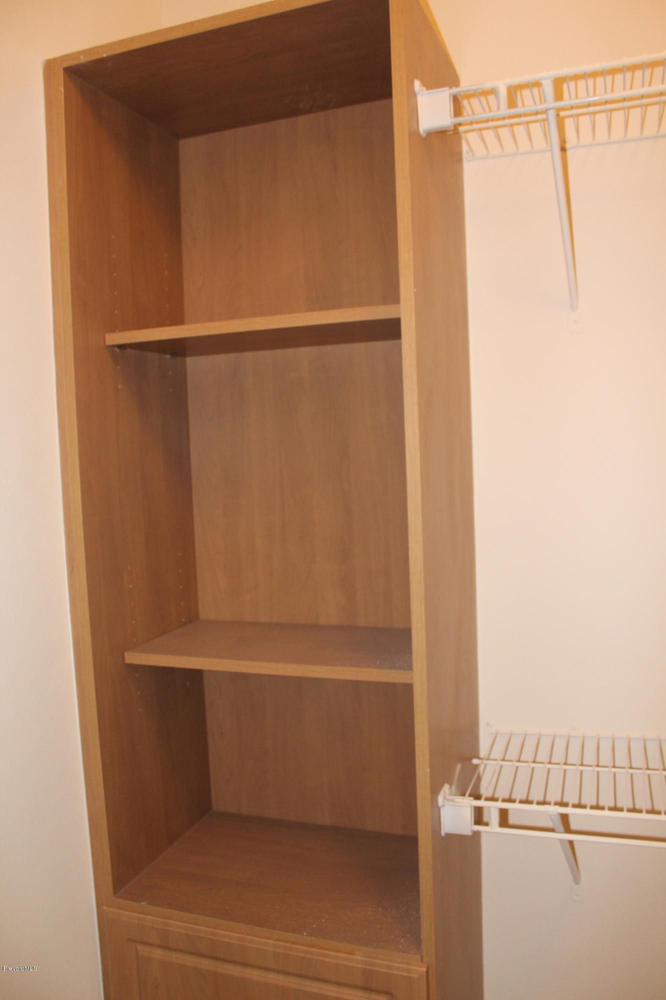 1419 Belleview Road Cocoa, FL 32922 - Photo 7 of 20 Walk-in closet with built-in