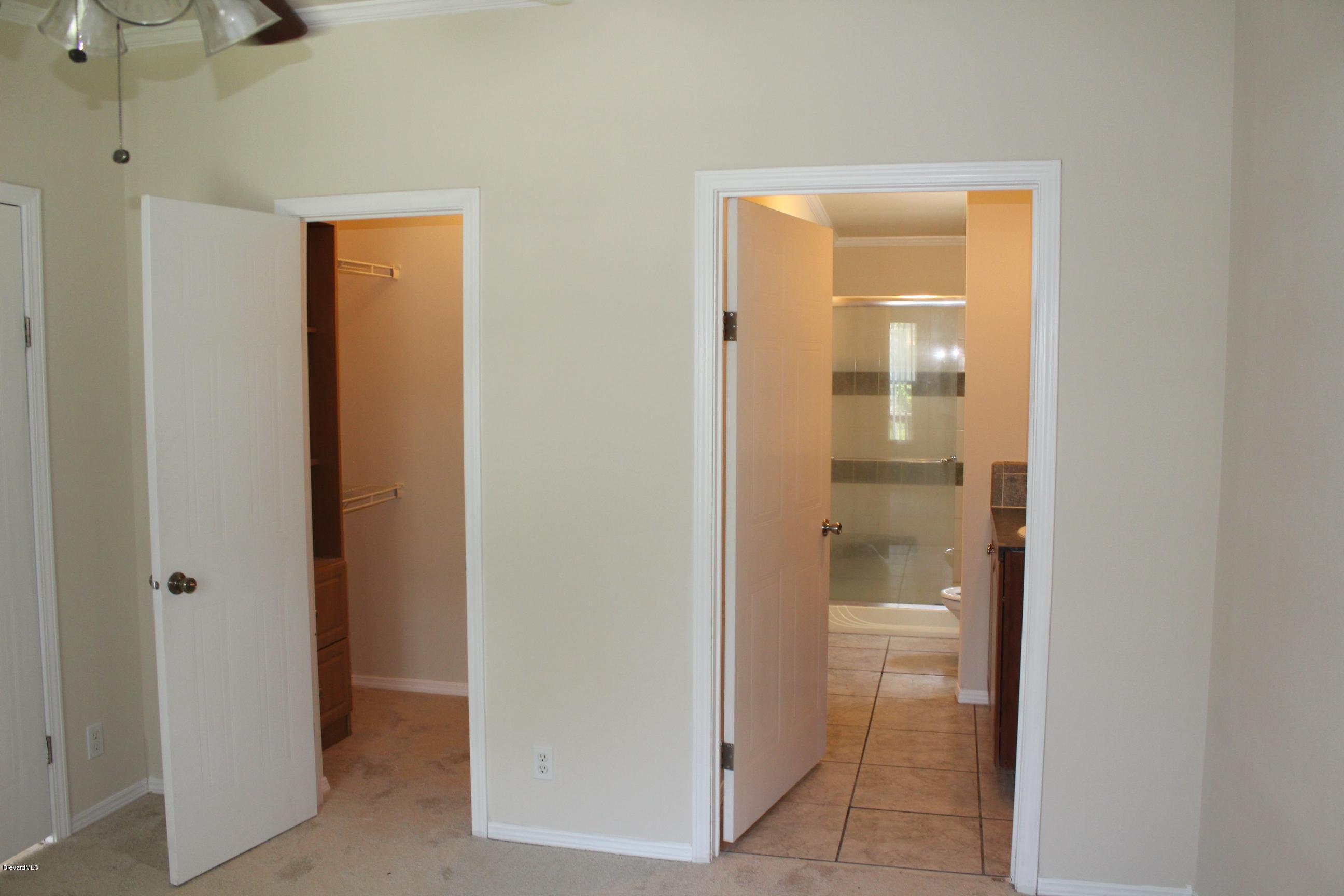 1419 Belleview Road Cocoa, FL 32922 - Photo 8 of 20 Master bedroom with walk-in closet