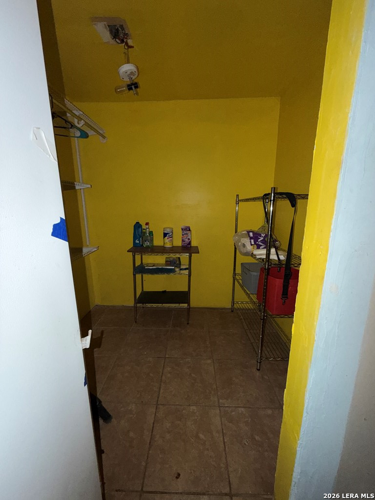 3148 Leonel Street Eagle Pass, TX 78852 - Photo 10 of 18 a view of walk in closet with empty racks