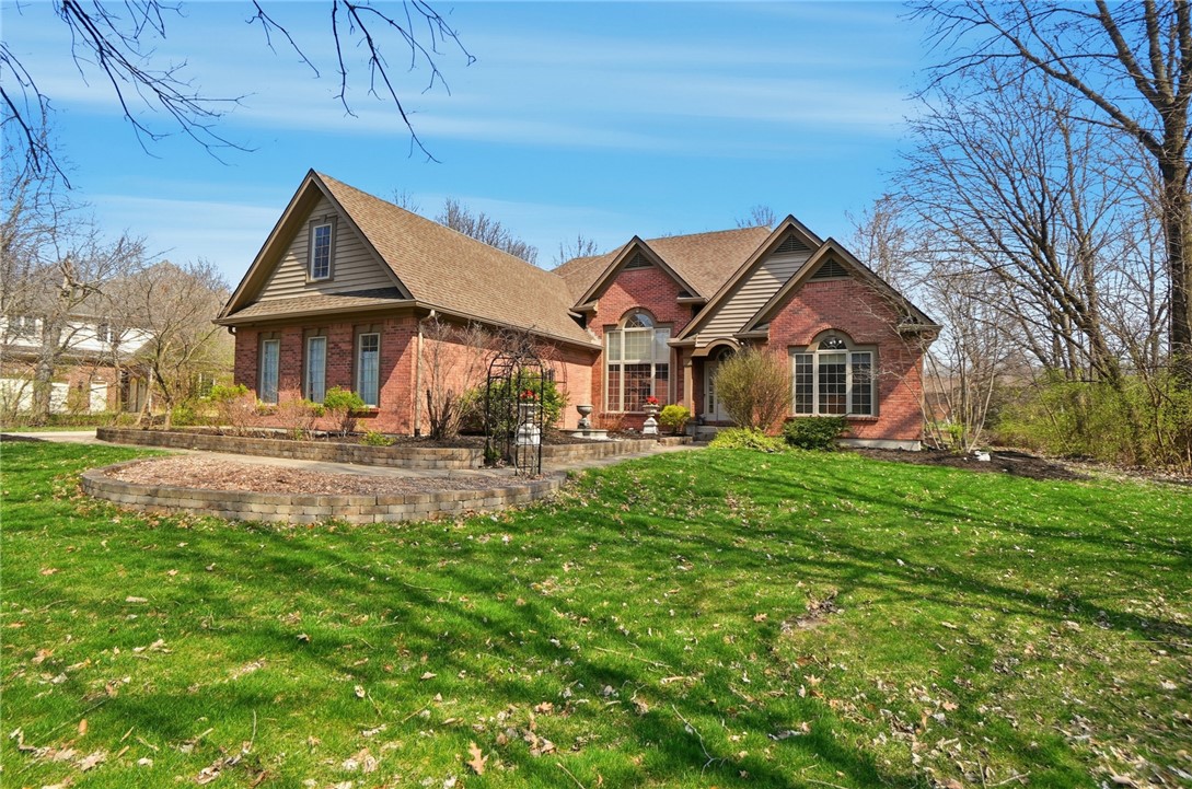 472 Timber Walk Court Springboro, OH 45066 - Photo 62 of 86 This classic brick residence boasts enduring appeal and a spacious, verdant front lawn.