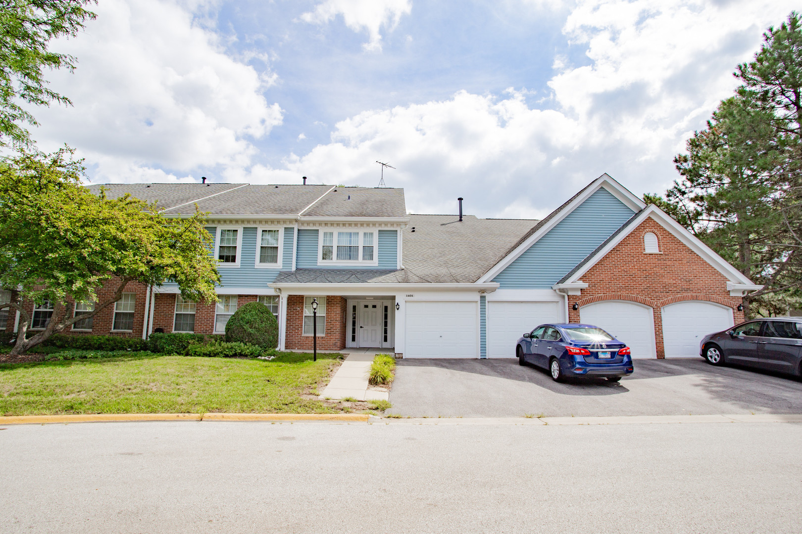 a car parked in front of a house