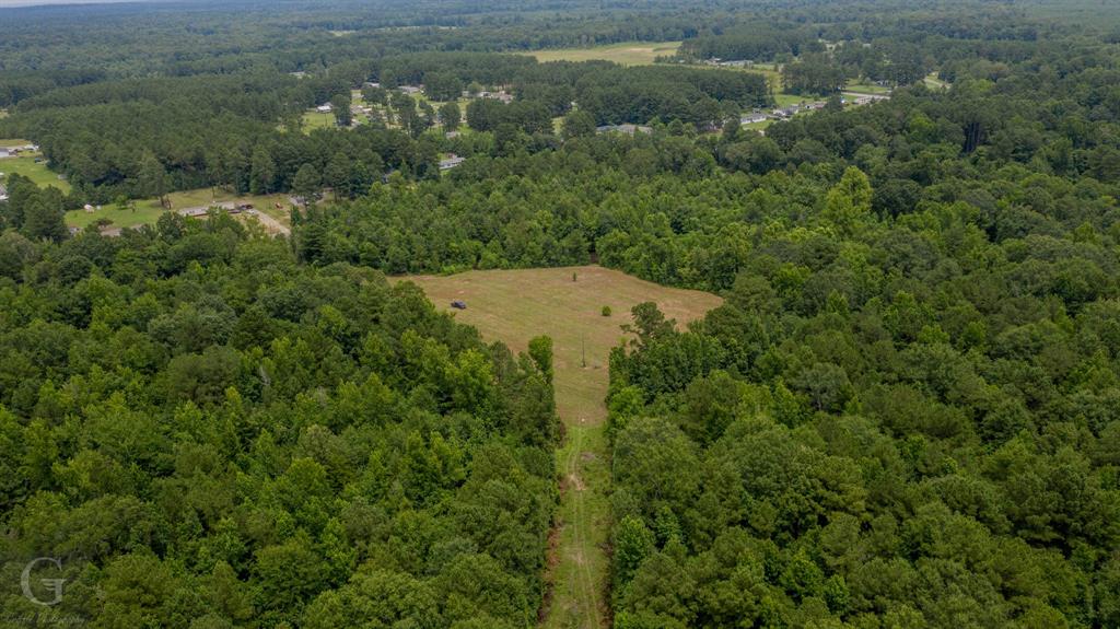 436 English Gloster, LA 71030 - Photo 8 of 13 an aerial view of a houses with a yard and lake