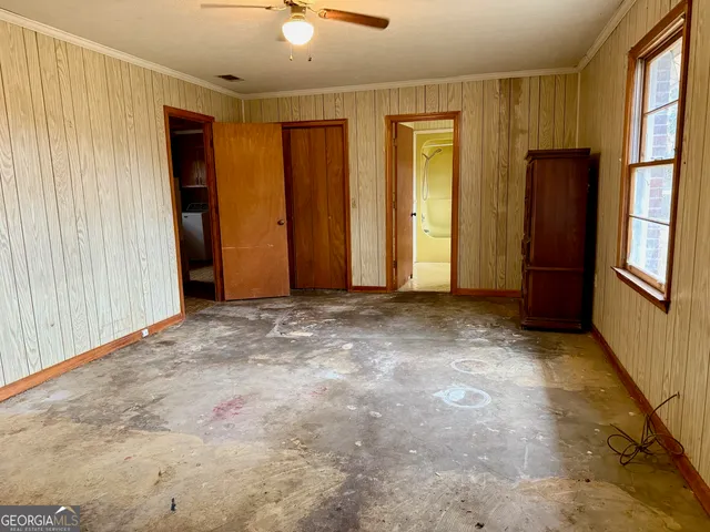 an empty room with windows