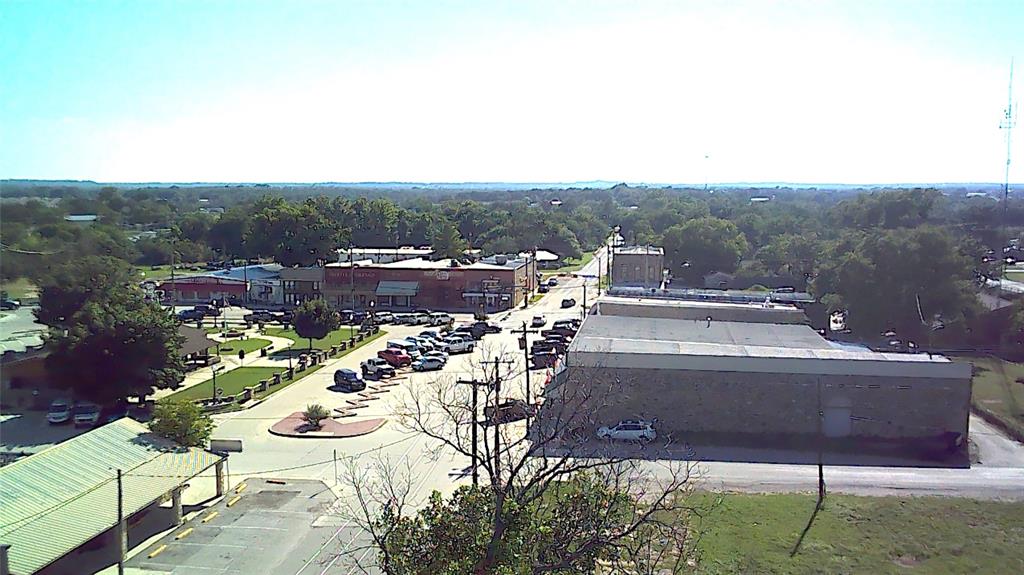 209 East 1st Street Springtown, TX 76082 - Photo 5 of 9 a view of a terrace with furniture