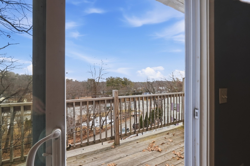 5 Swan Avenue, Unit B Worcester, MA 01602 - Photo 13 of 25 a view of a balcony with wooden floor
