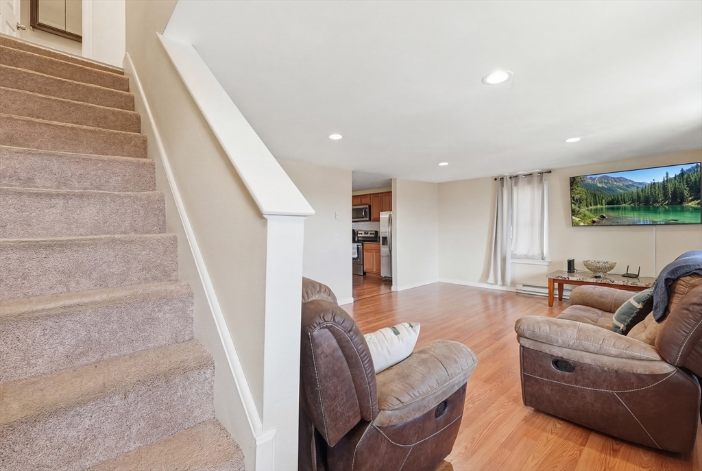 5 Swan Avenue, Unit B Worcester, MA 01602 - Photo 3 of 25 a living room with furniture and a couch