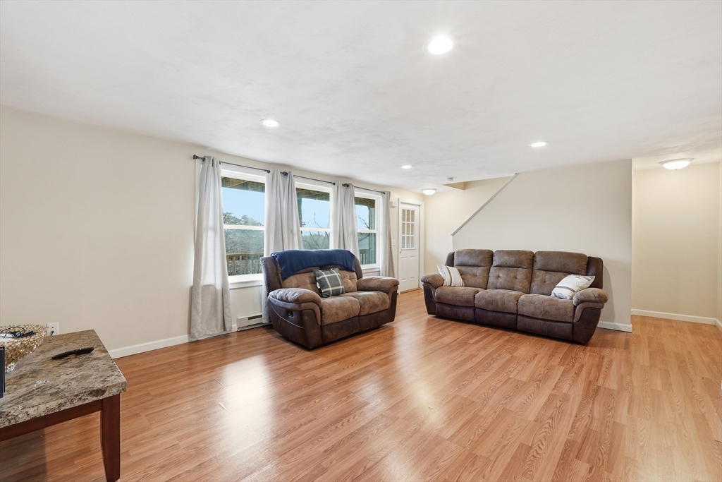 5 Swan Avenue, Unit B Worcester, MA 01602 - Photo 4 of 25 a living room with furniture and a hard wood floor