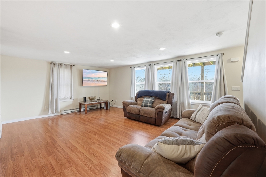 5 Swan Avenue, Unit B Worcester, MA 01602 - Photo 5 of 25 a living room with furniture and a large window