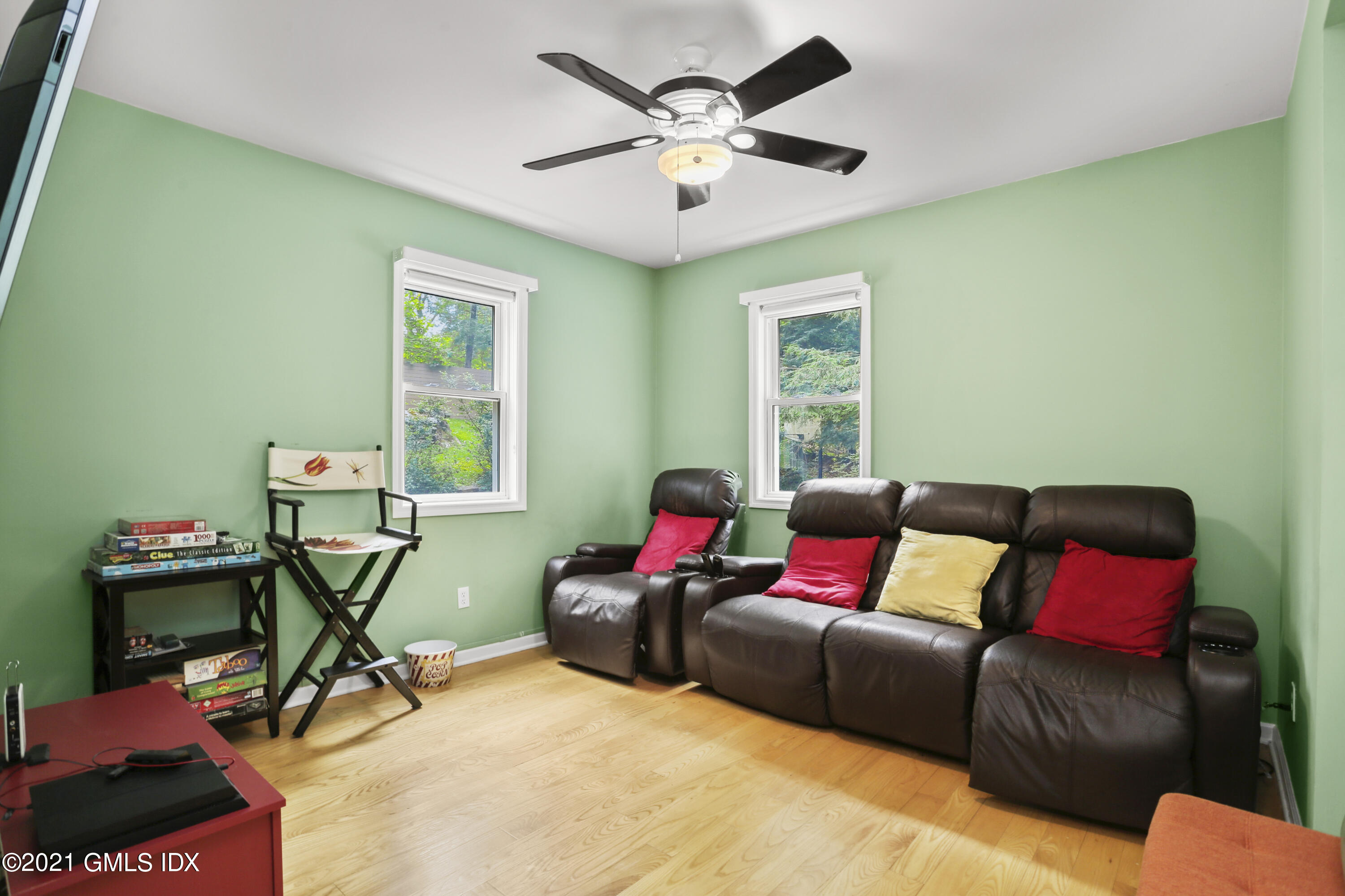 349 Riversville Road Greenwich, CT 06831 - Photo 13 of 28 a living room with furniture a air conditioner and a window