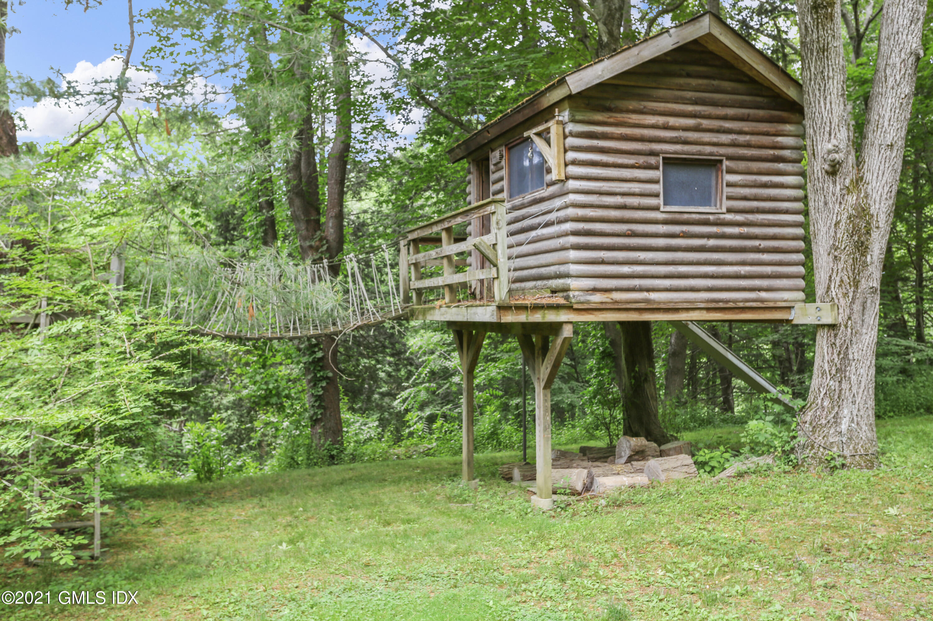 349 Riversville Road Greenwich, CT 06831 - Photo 22 of 28 a view of a house with backyard