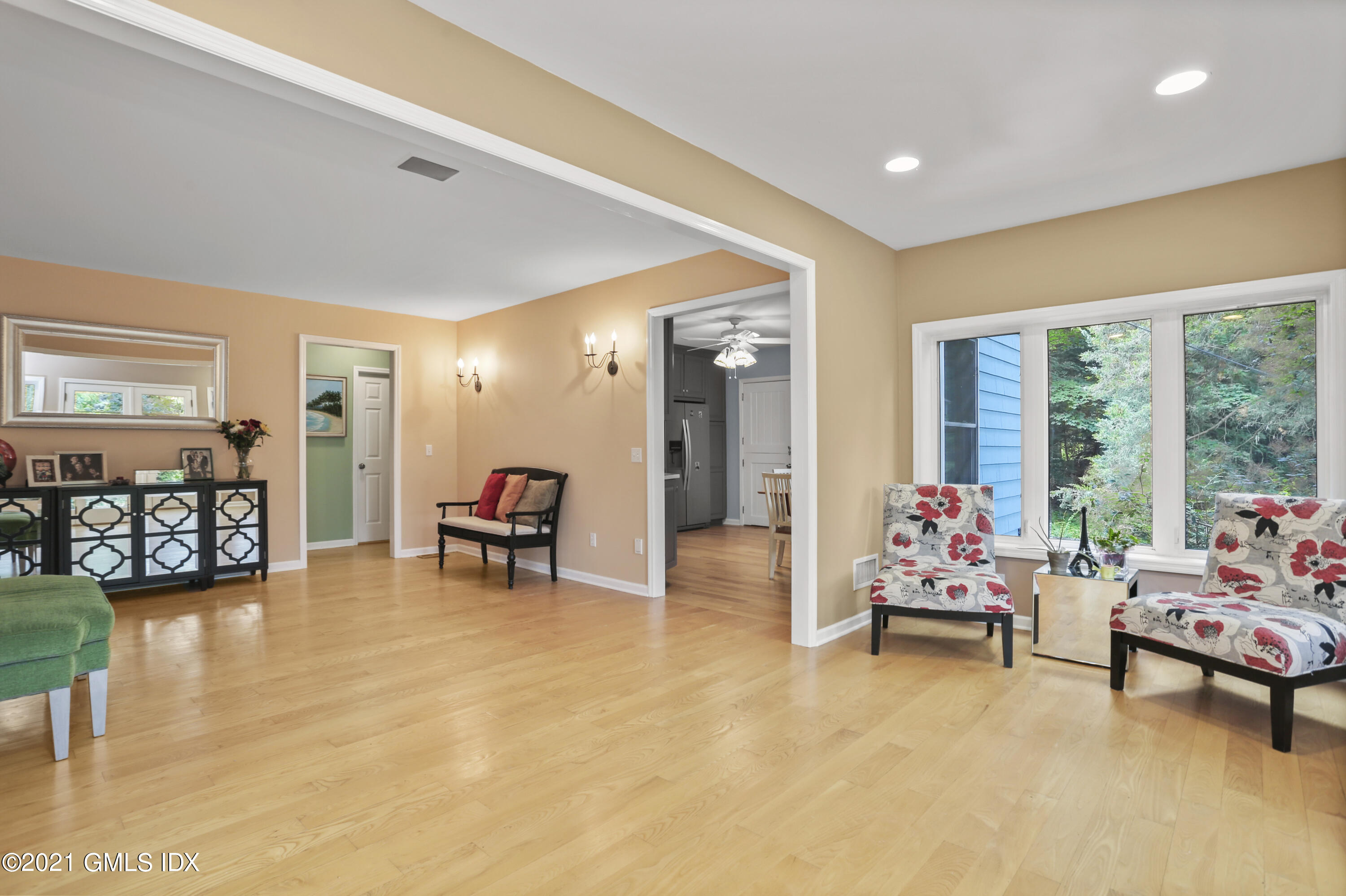 349 Riversville Road Greenwich, CT 06831 - Photo 9 of 28 a living room with furniture and a large window