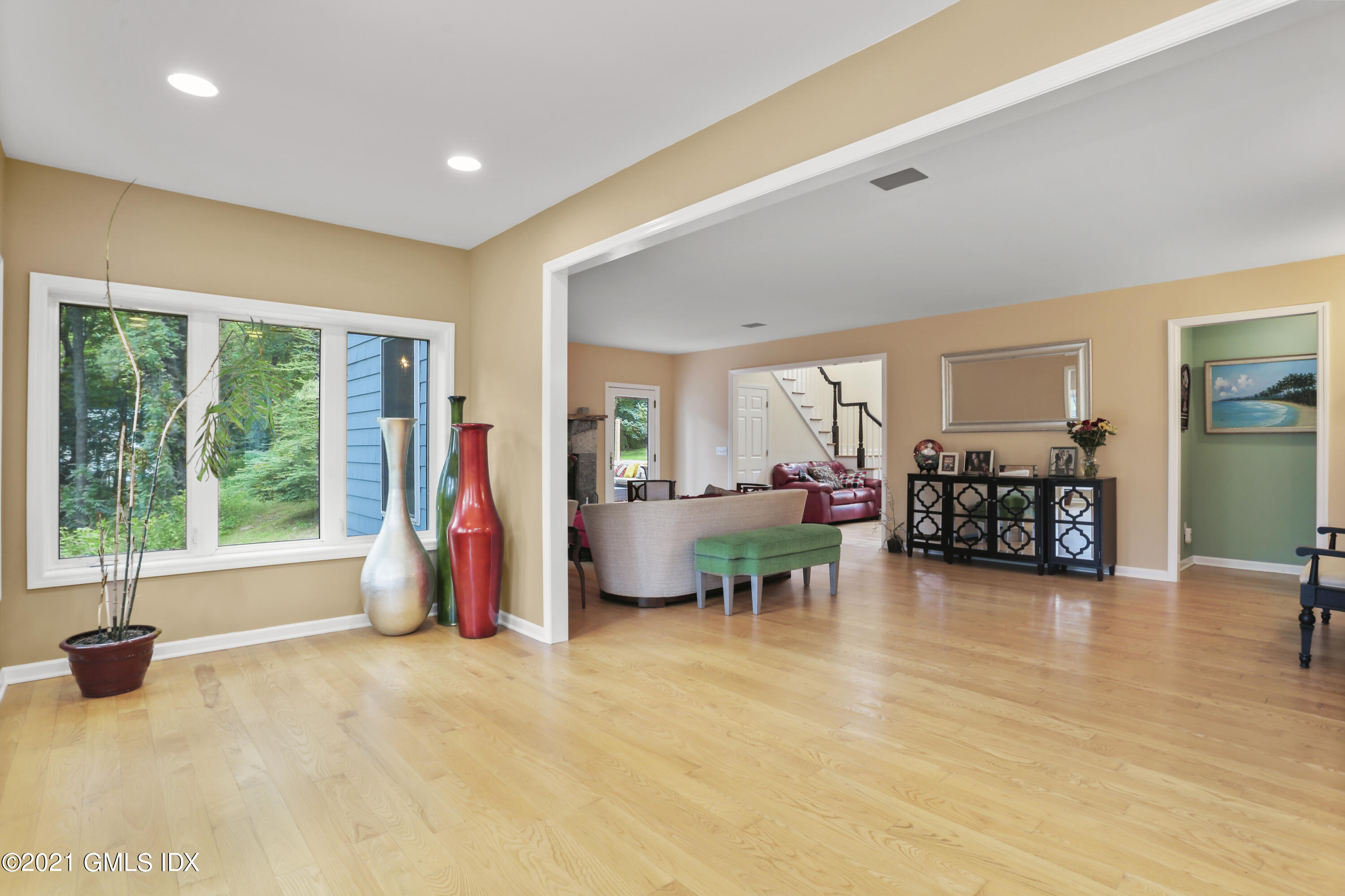 349 Riversville Road Greenwich, CT 06831 - Photo 10 of 28 a living room with furniture and a large window
