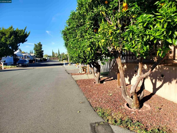 a view of a hallway with a chandelier