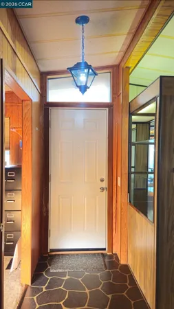 a view of a workspace with furniture