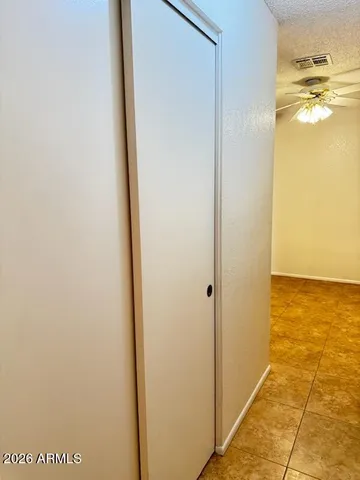 a view of bathroom from a hallway