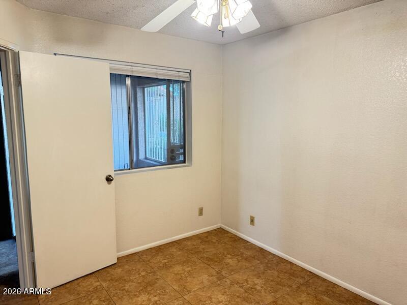 97 North Cooper Road, Unit 91 Chandler, AZ 85225 - Photo 14 of 28 an empty room with a window