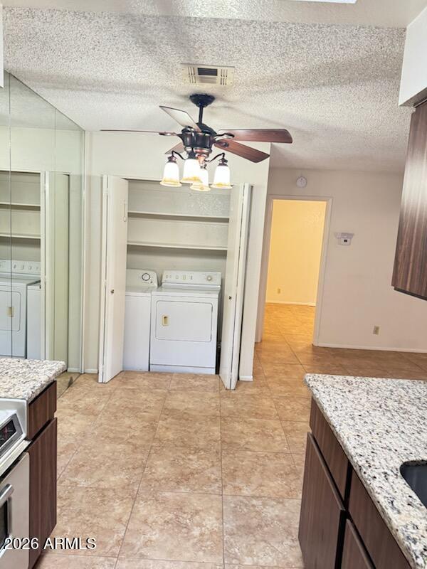 97 North Cooper Road, Unit 91 Chandler, AZ 85225 - Photo 6 of 28 a view of a kitchen cabinets and refrigerator