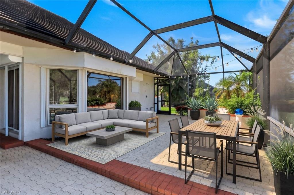 2227 Regal Way Naples, FL 34110 - Photo 19 of 34 Lanai Pool Deck Virtual Staged