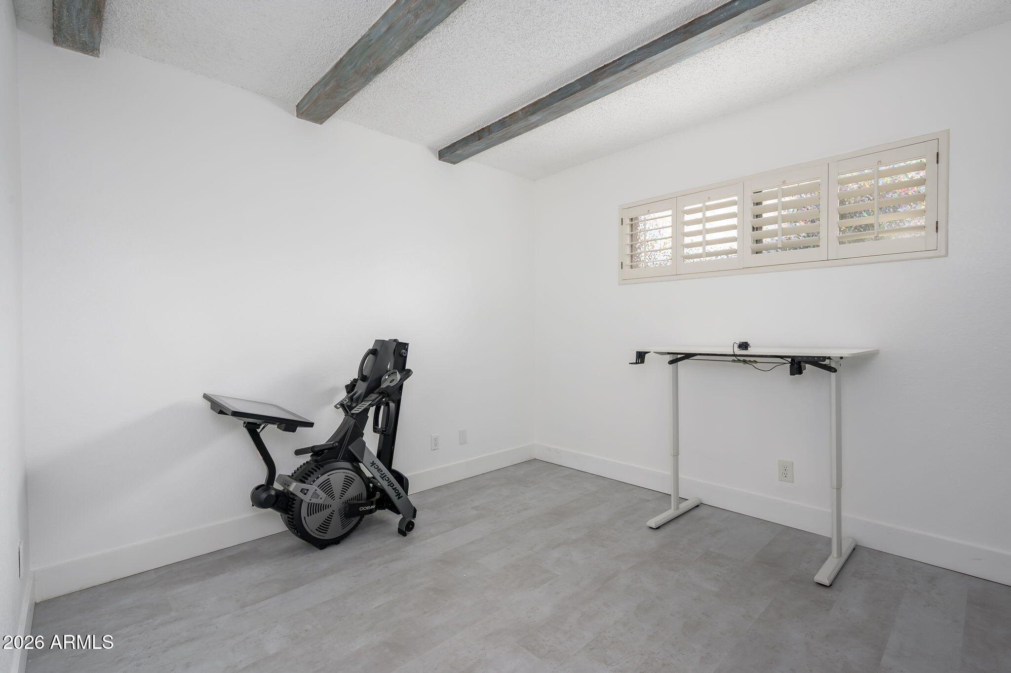 1004 East Osborn Road, Unit B Phoenix, AZ 85014 - Photo 12 of 22 an empty room with windows
