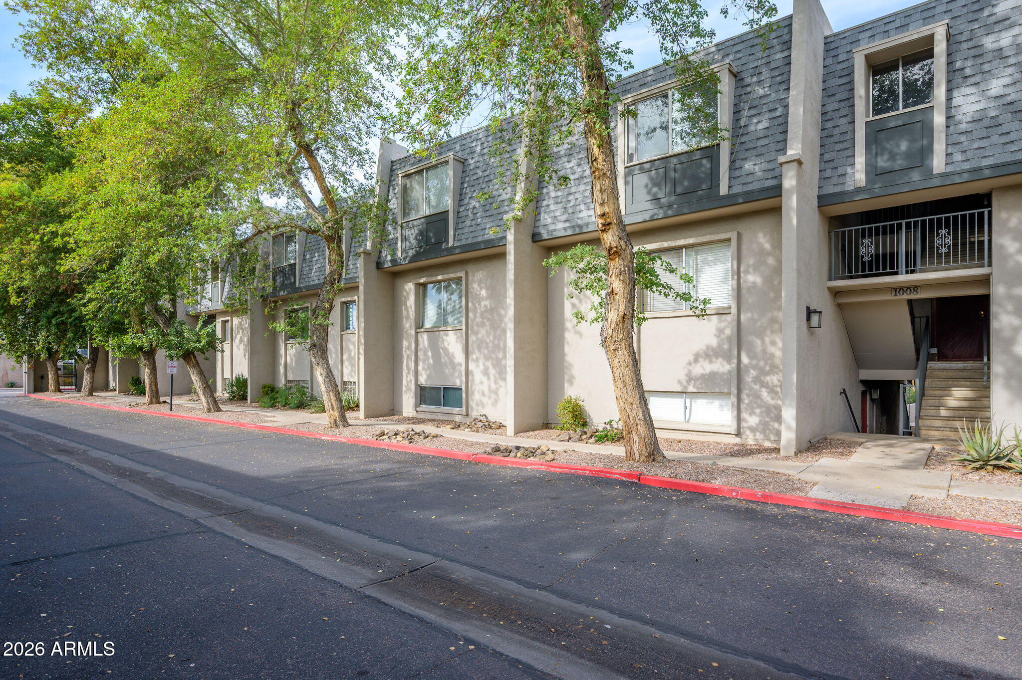 1004 East Osborn Road, Unit B Phoenix, AZ 85014 - Photo 21 of 22 a view of a building with a street