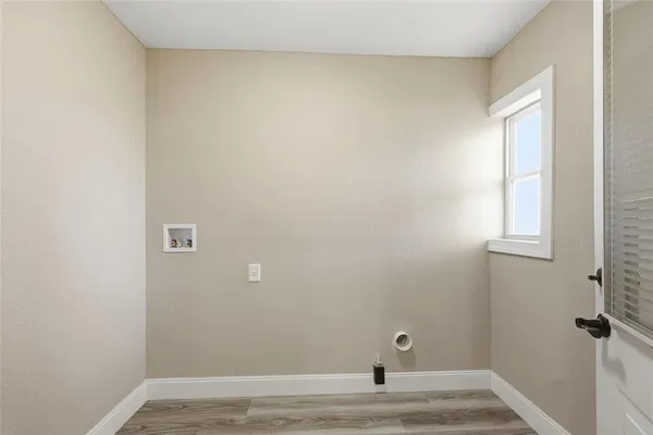 a view of small space with wooden floor