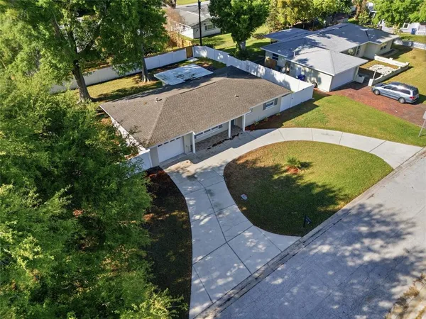 an aerial view of a swimming pool