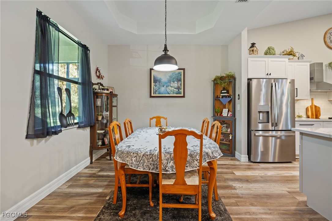 2391 Lippincott Road Alva, FL 33920 - Photo 15 of 50 a dining room with furniture and window