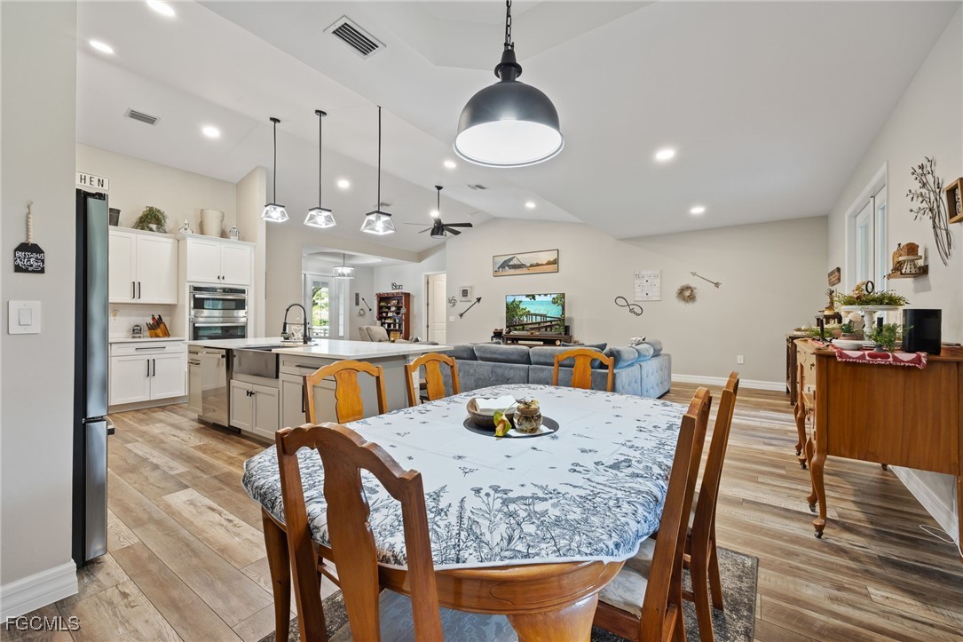 2391 Lippincott Road Alva, FL 33920 - Photo 17 of 50 a view of a dining room and livingroom