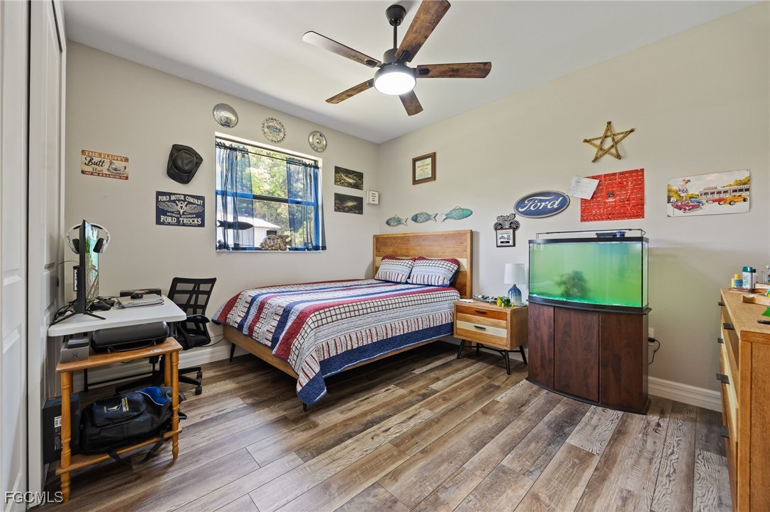 2391 Lippincott Road Alva, FL 33920 - Photo 29 of 50 a bedroom with a bed and a window