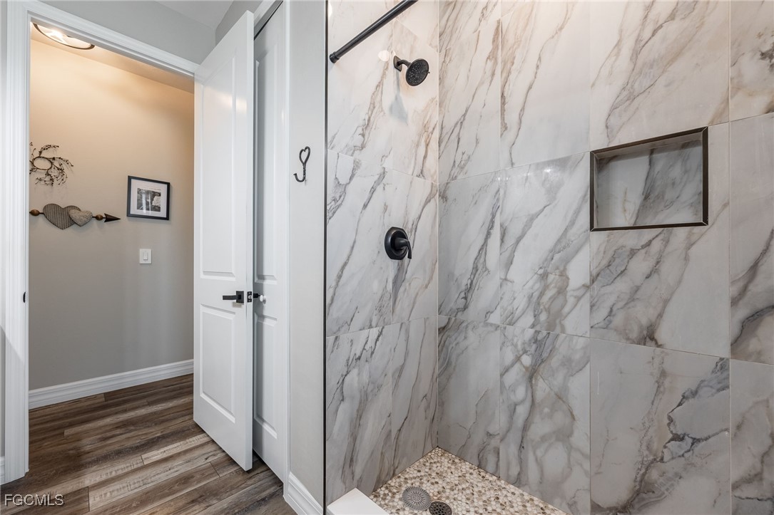 2391 Lippincott Road Alva, FL 33920 - Photo 32 of 50 a bathroom with a shower