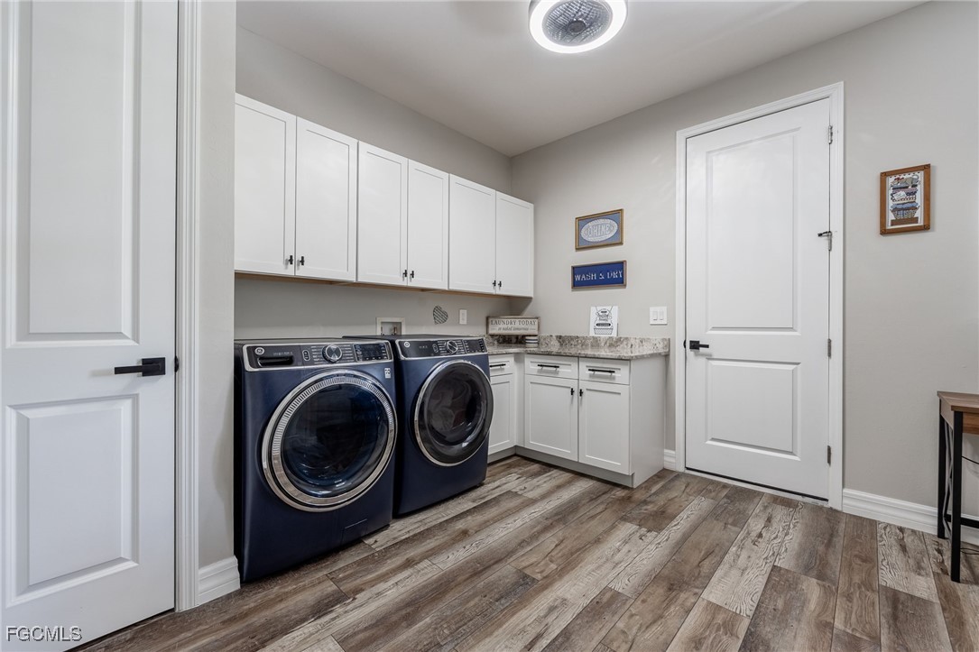 2391 Lippincott Road Alva, FL 33920 - Photo 35 of 50 a view of a kitchen with sink washer and dryer