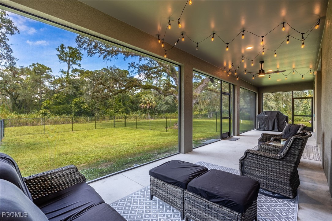 2391 Lippincott Road Alva, FL 33920 - Photo 39 of 50 a outdoor living space with furniture and garden view
