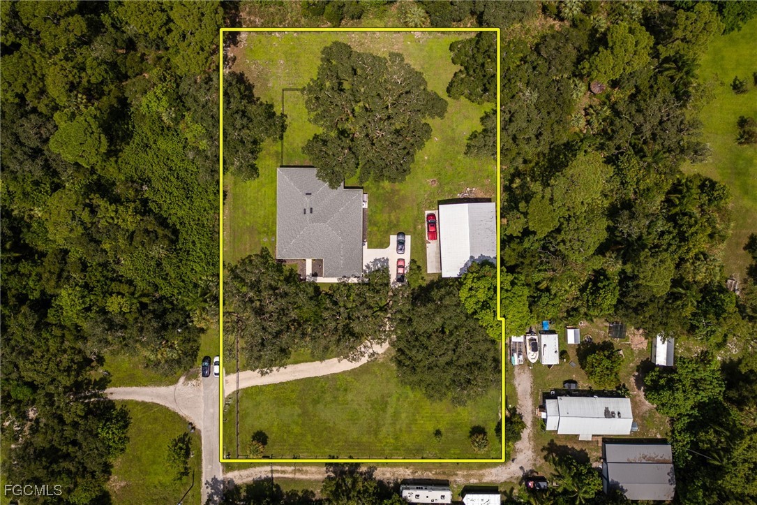 2391 Lippincott Road Alva, FL 33920 - Photo 48 of 50 an aerial view of a residential houses