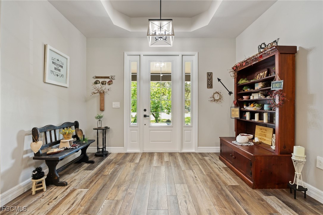 2391 Lippincott Road Alva, FL 33920 - Photo 9 of 50 a living room with furniture and a window