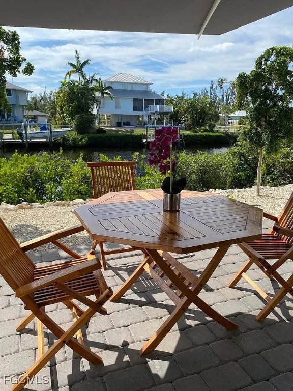5351 Ann Arbor Drive Bokeelia, FL 33922 - Photo 18 of 21 a view of a backyard with sitting area