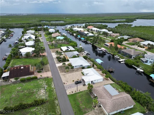 an aerial view of a house with a garden