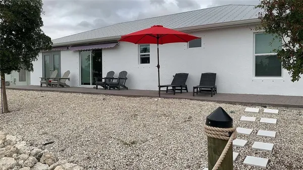 a table and chairs in the patio