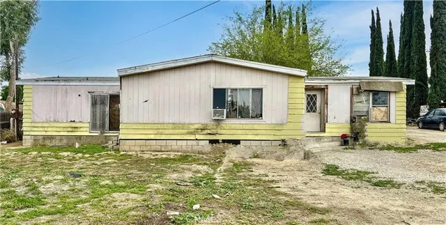 a view of a house with a swimming pool