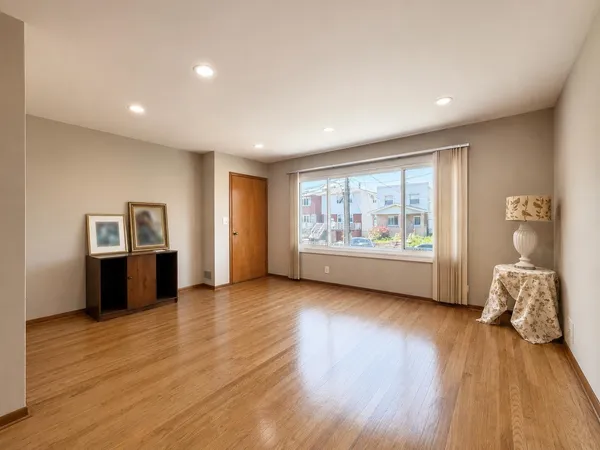a view of workspace with wooden floor and window
